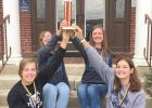 The Shelton High Quiz Bowl ladies, left to right, Samantha Snyder, Jaylea Pope, Skyler Summers, and Sidney Gegg display the trophy they earned by winning the Seward Young Women’s Quiz Bowl. (–courtesy photo) Shelton Quiz Bowl teams continue successful season