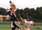 The Bulldogs’ Owen Strauss goes over two Wilcox/Hildreth defenders to come down with the football in Friday night’s matchup at Shelton. Owen hauled in six passes for 124 yards on the night.