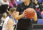 Shelton senior Kaycee Tompkin looks for a cutting teammate during Lady Bulldog basketball action at the Ravenna Holiday Tournament held last week. (—photo by Jeanette Branson)