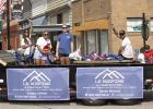 Plenty of smiles and treats from the L6 Roofing float.