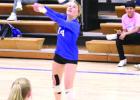 Meagan Benker passes the ball to her setter during the match against Centura Monday evening. (—photo by Steve Glenn) Article Image Alt Text
