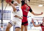 Gibbon freshman Zion Adkins draws contact while going in for a layup against Doniphan/Trumbull last week. Adkins put in ten points in the game for the Buffs. (—courtesy photo) Gibbon freshman Zion Adkins draws contact while going in for a layup against Doniphan/Trumbull last week. Adkins put in ten points in the game for the Buffs. (—courtesy photo)