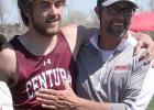 Eli Wooden, shown here with Coach Cyboron, aided the Centurions’ dominance at the LouPlatte Conference meet last week by running a leg on a championship relay and by winning three individual events, one of which shattered the long jump record that had s Centurion boys dominant force, Davis wins event at LPC track meet