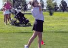 Avery Miles takes a shot during the Lady Eagles’ season opening golf meet, the Central City Scramble last week at Marquette. (–courtesy photo)