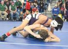 Looking for back points for the Eagles is 106 pounder Jhonny Trejo. A fourth place finish at the district meet ensures Trejo a ticket to the state meet in Omaha this weekend. (—photo by Amber Price) Looking for back points for the Eagles is 106 pounder Jhonny Trejo. A fourth place finish at the district meet ensures Trejo a ticket to the state meet in Omaha this weekend. (—photo by Amber Price)