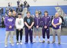 The Wood River Eagles have four wrestlers moving on to the state tournament. Standing, from left to right, are coaches Austin Ruskamp and Jay Martin; wrestlers Jhonny Trejo, Tommy Leetch, Riley Waddington, and Dylan Ancheta; and coach Darin Waddington. (—photo by Amber Price) The Wood River Eagles have four wrestlers moving on to the state tournament. Standing, from left to right, are coaches Austin Ruskamp and Jay Martin; wrestlers Jhonny Trejo, Tommy Leetch, Riley Waddington, and Dylan Ancheta; and coach Darin Waddington. (—photo by Amber Price)