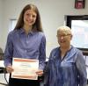 P.E.O. Chapter BI Star Scholarship Chair Cheryl Woodman (right) presents Erin Gegg the $2,500 STAR Scholarship from the P.E.O. Sisterhood. (—courtesy photo)